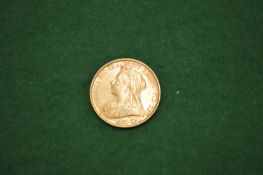 A Victorian gold sovereign dated 1899.