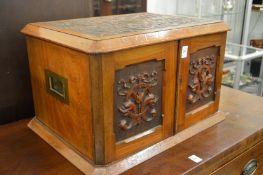 A good Victorian carved walnut table top cutlery canteen.
