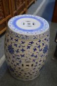 A Chinese blue and white pottery barrel seat.