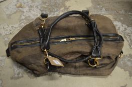 A leather holdall.