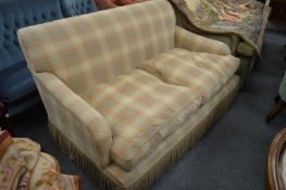 A modern check upholstered large two seater settee.