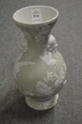 A Chinese green glaze bottle vase.
