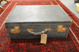 A leather suitcase.