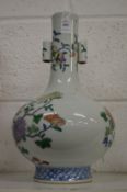 A Chinese porcelain bottle vase (faults).