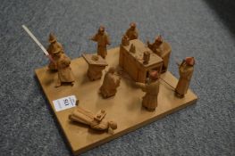 A Chinese carved wood figural diorama 'Punishment Scene'.