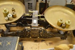 A good large set of cast iron and brass scales.