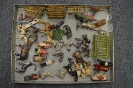 A good collection of cast metal farmyard animals, figures and accessories.