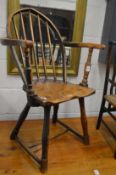 An unusual small 19th century ash, beech and elm Windsor stick back armchair.