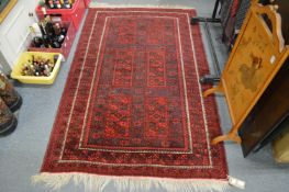 A modern Persian design rug 185cm x 115cm.