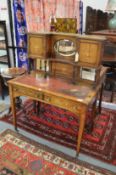 A Victorian marquetry inlaid rosewood bonheur du jour.