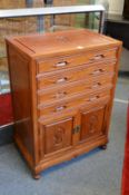 A Chinese hardwood floor standing cutlery canteen/cabinet.