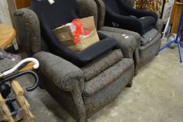 A pair of Victorian armchairs.