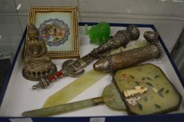 A Chinese jade hand mirror and other Eastern collectables.