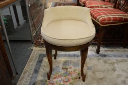 A revolving music seat.