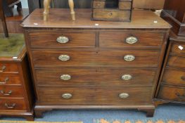 A 19th century mahogany straight front chest of drawers with canted corners.