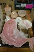 A large fish dish and other items.
