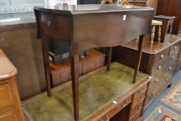 A reproduction mahogany Pembroke table.