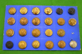 A collection of 23 military buttons including The Queens Own, Inniskilling etc.