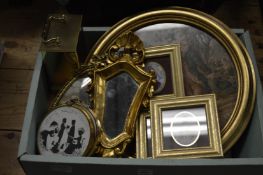 Decorative pictures, mirror and a clock.