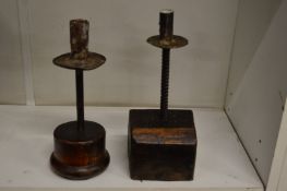 Two rustic candlesticks.