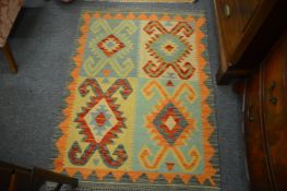 A colourful Kilim rug 125cm x 90cm.