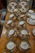 A good collection of Crown Derby, Imari cups, saucers and plates.