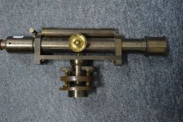 Dancer Manchester, a brass surveying level.