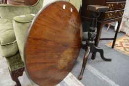 A mahogany tripod table (af).