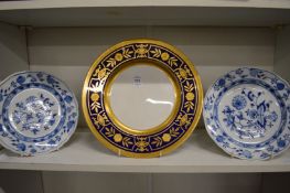A Minton gilt decorative cabinet plate and two Meissen onion pattern plates (Meissen plates af).