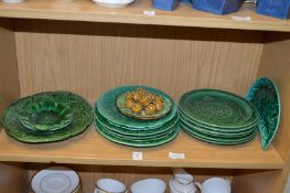 Cabbage leaf plates and a Palissy style dish of walnuts.