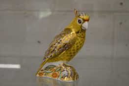 A Crown Derby model of a Citron Cockatoo.