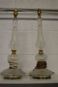 A pair of cut glass lamps.
