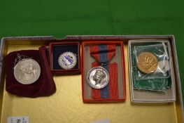 Decorative medals and badges.