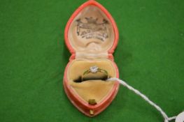 A 18ct gold solitaire diamond ring.