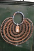An African wicker necklace.