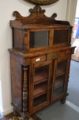 A Regency simulated rosewood and brass mounted chiffonier with upper section.
