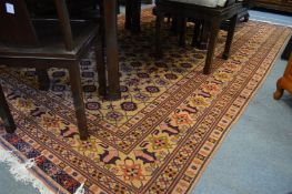 A Persian design carpet, beige ground with stylised decoration 300cm x 195cm.