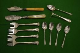 Silver and other spoons.