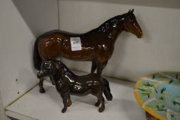 Two Beswick horses.