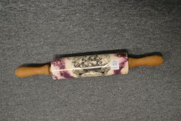 A lustre decorated rolling pin.