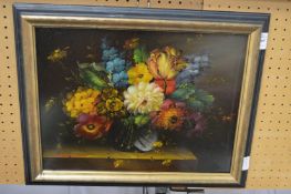 A still life of flowers in a vase on a ledge, oil on board.