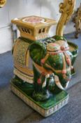 A colourful Chinese pottery elephant stand.