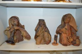 Three unusual terracotta figures.