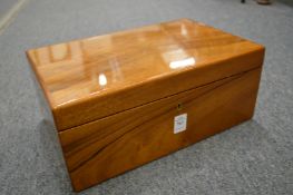 Asprey & Co, a humidor complete with cigar cutter.