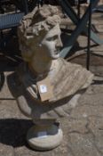 A composite garden ornament modelled as the bust of a classical Roman man.