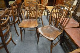 A good pair of 19th century ash and elm wheelback single dining chairs.