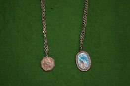 A silver and enamel pendant and chain.