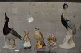 Two Continental porcelain models of birds, a Royal Worcester porcelain model of a thrush and two
