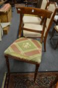 A Victorian simulated walnut dining chair and a pair of Continental walnut dining chairs.