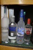 Four bottles of vodka comprising Absolut 1 litre, Belvedere 1 litre, Grey Goose 700ml and Smirnoff